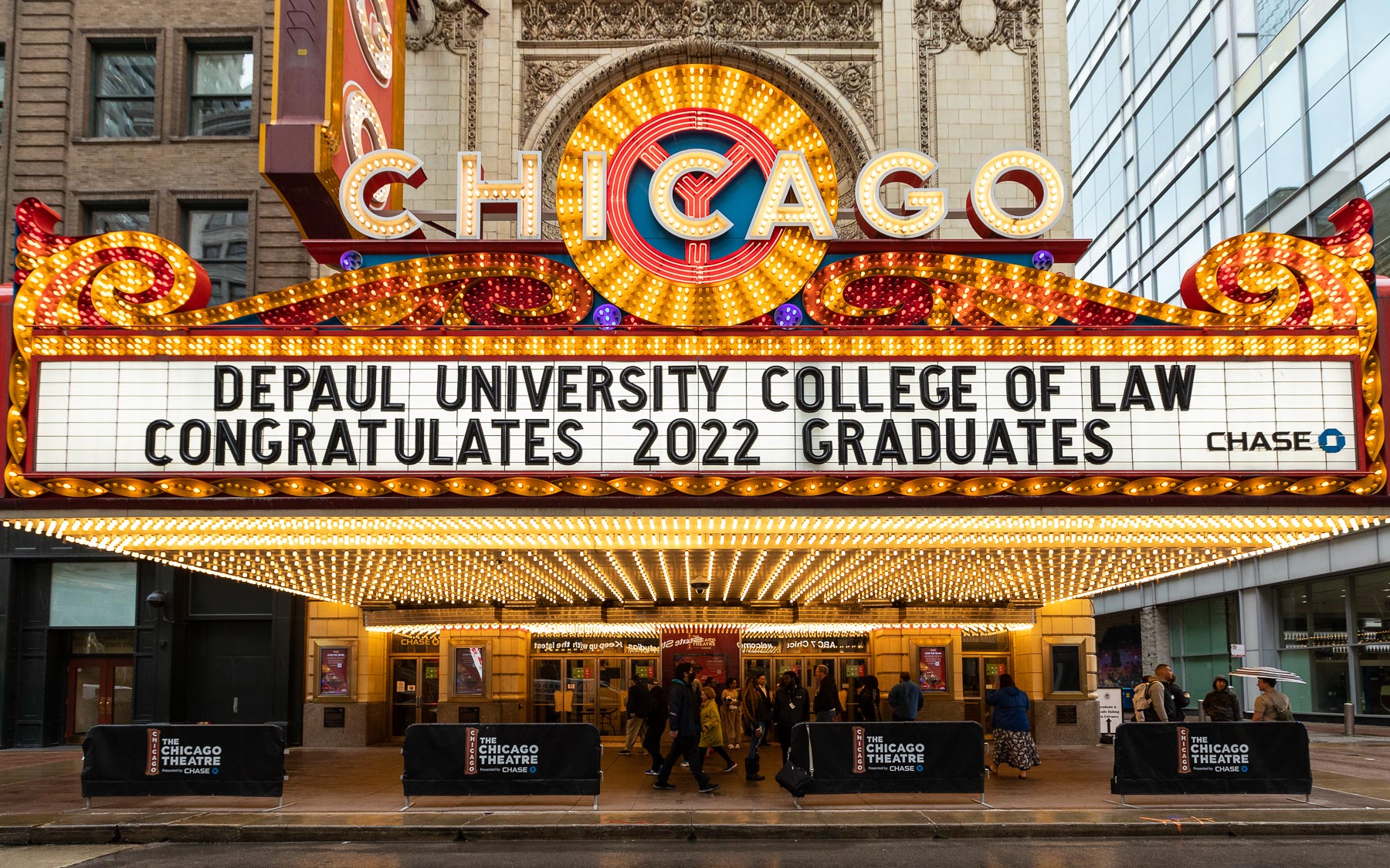 The famous Chicago Theatre marquee welcomes DePaul graduates and their guests to the College of Law ceremony on Saturday, May 21.